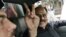 Former Inter-Services Intelligence head Hamid Gul gives a "victory" sign after his arrest under a state of emergency in Islamabad in 2007.