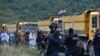 Specijalci Policije Kosova na graničnom prelazu Jarinje gde su se građani iz srpskih opština skupili na protestu i blokadi prvog dana primene odluke o skidanju tablica, 20. septembar 2021. 