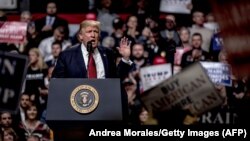 US -- NASHVILLE, TN - MARCH 15: President Donald Trump speaks at a rally on March 15, 2017 in Nashville, Tennessee. During his speech Trump promised to repeal and replace Obamacare and also criticized the decision by a federal judge in Hawaii that halted 