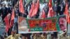 Lawyers and opposition activists march in Lahore.