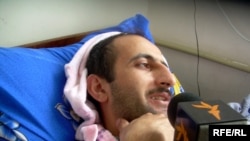 Idrak Abbasov in a Baku hospital bed