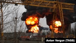 Smoke rises over an oil depot hit by fire in Belgorod, Russia, in April.