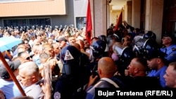 Veterans protest in Pristina against the law on minimum wage
on June 6.