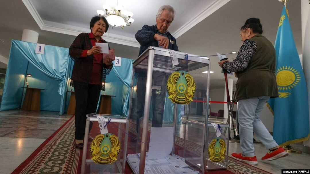Voters cast their ballots at a polling station in the capital, Nur-Sultan, on June 5.