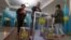 Voters cast their ballots at a polling station in the capital, Nur-Sultan, on June 5.