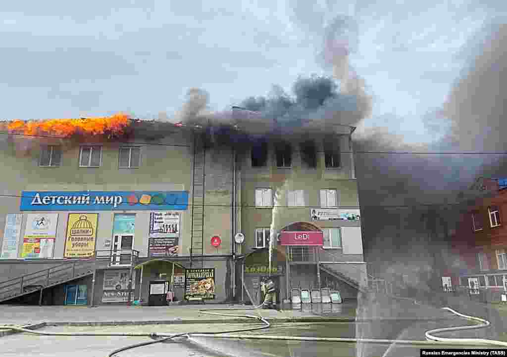 A shopping center burns in Ishim, in the southern Tyumen region of Russia, on April 28.&nbsp;