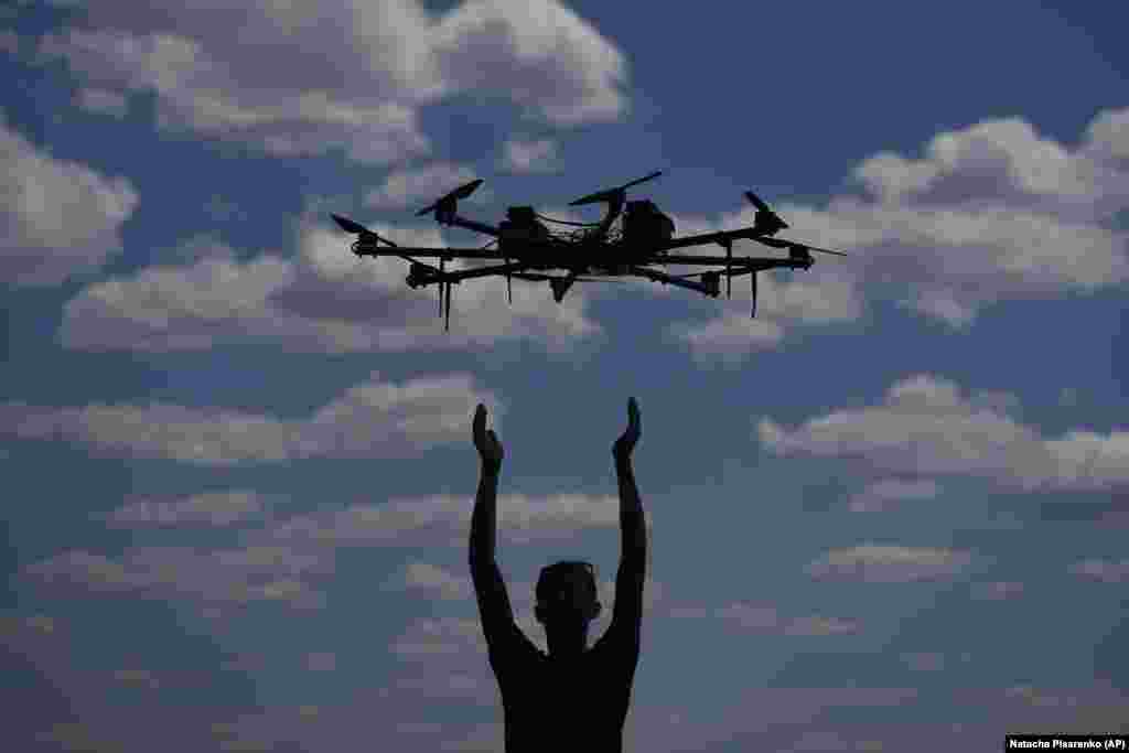 A drone expert tests out a model on the outskirts of Kyiv on June 8. Drones are been extensively used by both Russian and Ukrainian forces in the war.&nbsp;