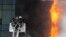 Russian firefighters tackle a blaze at a business center in Moscow on June 3. 