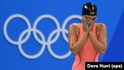 Russian swimmer Yulia Yefimova reacted tearfully to sniping over doping charges.