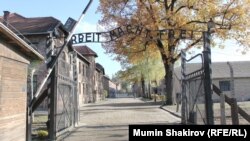 The infamous entrance to the former Nazi concentration camp Auschwitz-Birkenau, with the phrase "Arbeit macht frei" ("Work makes you free") above the gate.