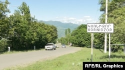 Armenia - A road sign at the entrance to the village of Kornidzor, June 7, 2022.