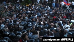 Armenia - Riot police clash with opposition protesters in Yerevan, June 3, 2022.