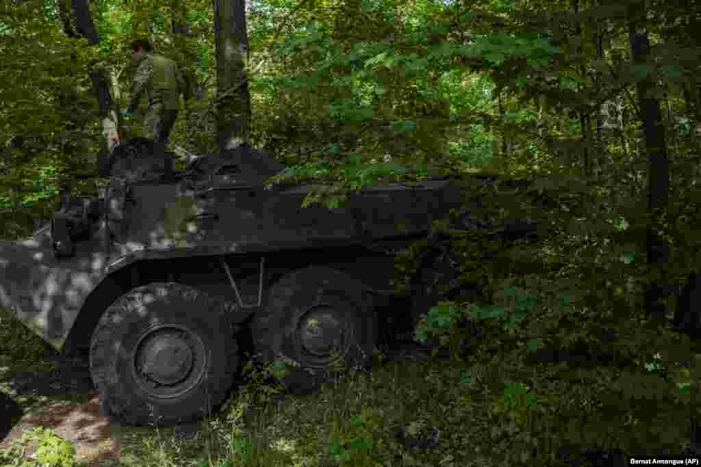 A Ukrainian soldier stands atop an armored vehicle near the front line in the Donetsk region.&nbsp;Ukrainian forces have counterattacked against Russian troops during fierce fighting in Syevyerodonetsk, winning back half of the key Donbas city according to regional governor Serhiy Hayday. But Ukrainian officials said on June 6 that they expect the situation to worsen there.