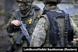 Finnish soldiers take part in the army's Arrow 22 exercise at the Niinisalo garrison in Kankaanpaa, Finland, on May 4.