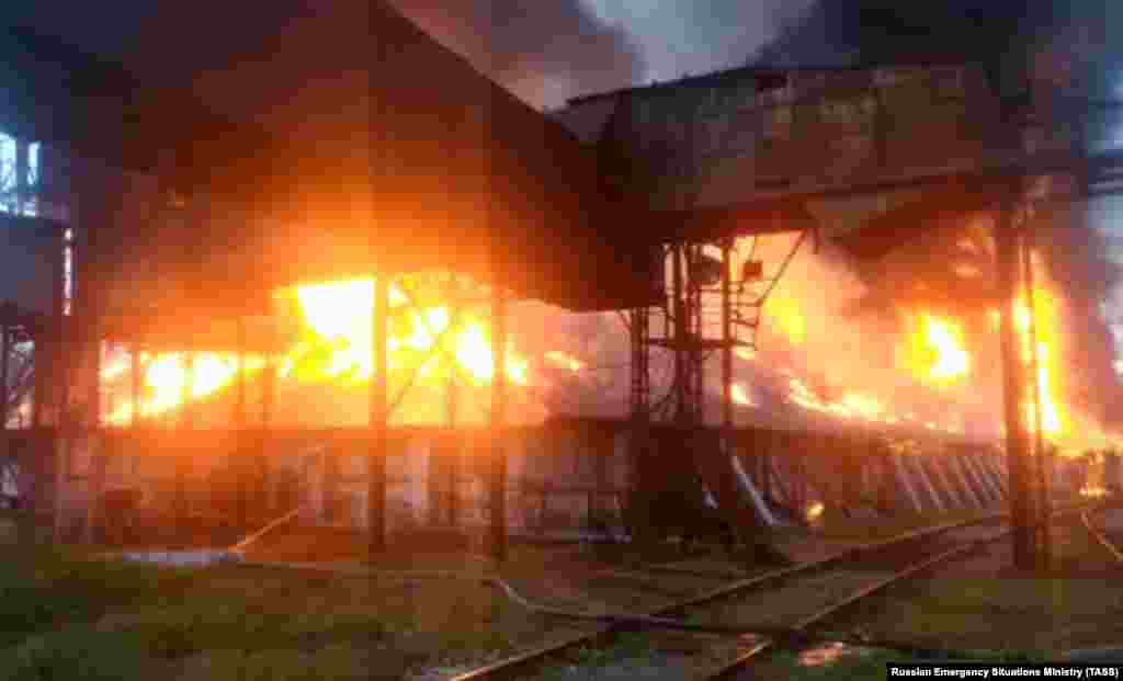 Fire consumes a storage warehouse for sunflower seeds near Penza, a city 550 kilometers southeast of Moscow, on May 21.&nbsp;