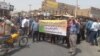 Retirees protest in Shoosh on June 6.