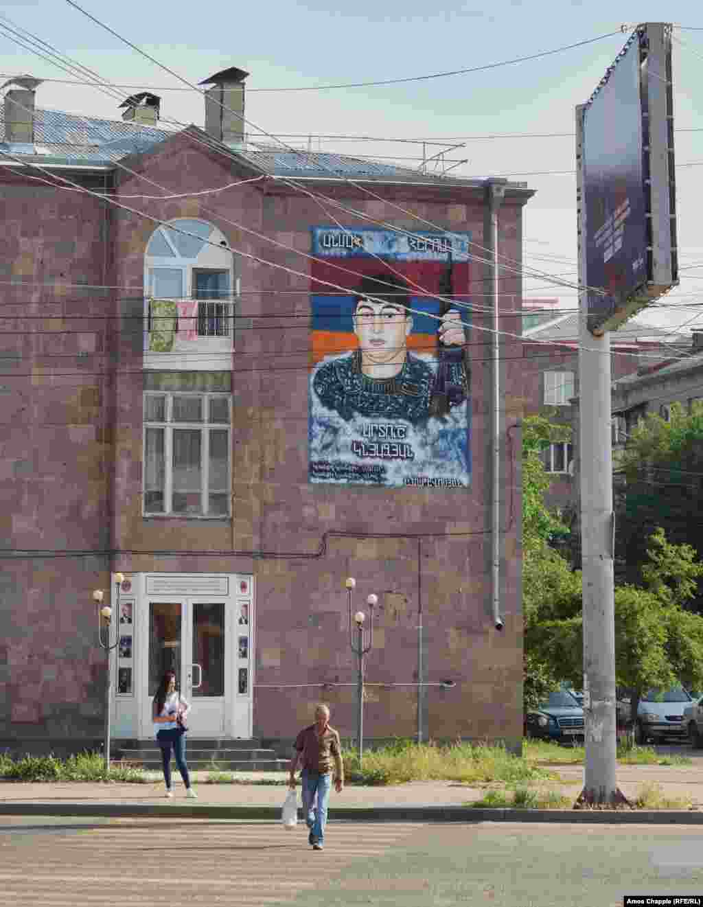 A mural in Gyumri honoring a fallen soldier that proclaims &quot;I died so that you may live.&quot;&nbsp; Arman Matevosyan, one of the artists behind the Gyumri murals,&nbsp;told a local journalist that the images of young men around his own age are &quot;extremely difficult to paint&quot; but he says the emotionally taxing work is made easier by the knowledge that the art is &quot;a consolation for parents.&quot;&nbsp; &nbsp;