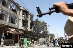 A view of the site where an explosive-laden vehicle detonated amidst an attack on a Sikh Temple in Kabul on June 18, 2022.