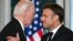 French President Emmanuel Macron (right) shakes hands with U.S. President Joe Biden during an official state dinner at the Presidential Elysee Palace in Paris on June 8.