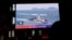 A China Coast Guard vessel is seen on a giant screen showing news footage about the coast guard's patrols in waters around Taiwan on April 1. 