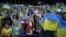 Ukraine fans celebrate their first goal in the play-off semifinal of the UEFA World Cup Qualifiers in Glasgow, Scotland, on June 1. 