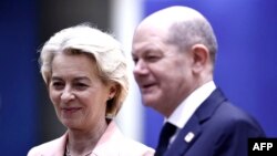 European Commission President Ursula von der Leyen and German Chancellor Olaf Scholz ahead of the European Council summit at EU headquarters in Brussels on March 21
