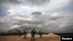 U.S. Marines patrol a remote eastern corner of Musa Qala district in southern Helmand Province in 2011.