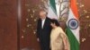 Indian Foreign Minister Sushma Swaraj (right) talks with Iranian counterpart Mohammad Javad Zarif in New Delhi.