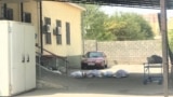 Bodies lie on the ground outside the morgue in the southern Kazakh city of Shymkent on August 13.