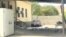 Bodies lie on the ground outside the morgue in the southern Kazakh city of Shymkent on August 13.