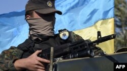 Боєць-доброволець тодішнього батальйону «Азов» на околиці Маріуполя, 5 вересня 2014 року