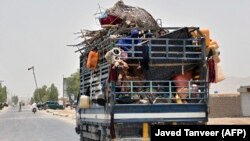 Izbeglice napuštaju Pandžvar distriht u provinciji Kandahar, nakon što su talibani zauzeli ključne položaje u tom delu Avganistana, 4. jul 2021. godine