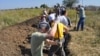 Residents of the southern Ukrainian city of Zaporizhzhya dig trenches to defend their city from pro-Russian or Russian forces in September.