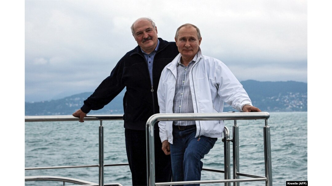 Russian President Vladimir Putin (right) and his Belarusian counterpart, Alyaksandr Lukashenka, pose on a boat during trip on the Black Sea earlier this year.