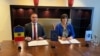 Directorul CNA, Alexandr Pînzari, și procurorul-șef al Parchetului European (EPPO), Laura Codruța Kovesi, semnează un acord de cooperare dintre cele două instituții la București, 26 noiemrbie.