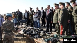 Armenia - Defense Minister Seyran Ohanian (C) inspects equipment used by the Armenian army's reconnaissance units, Arzni, 5Nov2013.