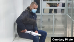 Denys Kulykovskiy appears in court in the southern city of Mariupol on November 10.