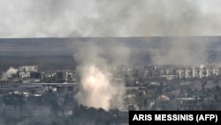 Smoke and dirt rise from shelling in the city of Syevyerodonetsk during ongoing fighting between Ukrainian and Russian forces in the eastern Ukrainian region of Donbas on June 7.
