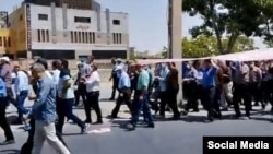 People in Arak protest over pensions and the cost of living.