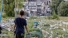 A boy named&nbsp;Vasyl views the aftermath of Russian shelling that destroyed his school in Bakhmut on June 8. The school, located in Ukraine&#39;s Donetsk region, had 400 students before Russia&#39;s invasion.