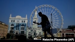 A street musician performs in the Ukrainian capital, Kyiv. (file photo)