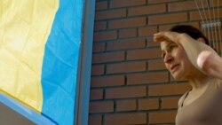 Flagging Trouble: Russian Woman Defies Kremlin With Ukrainian Colors