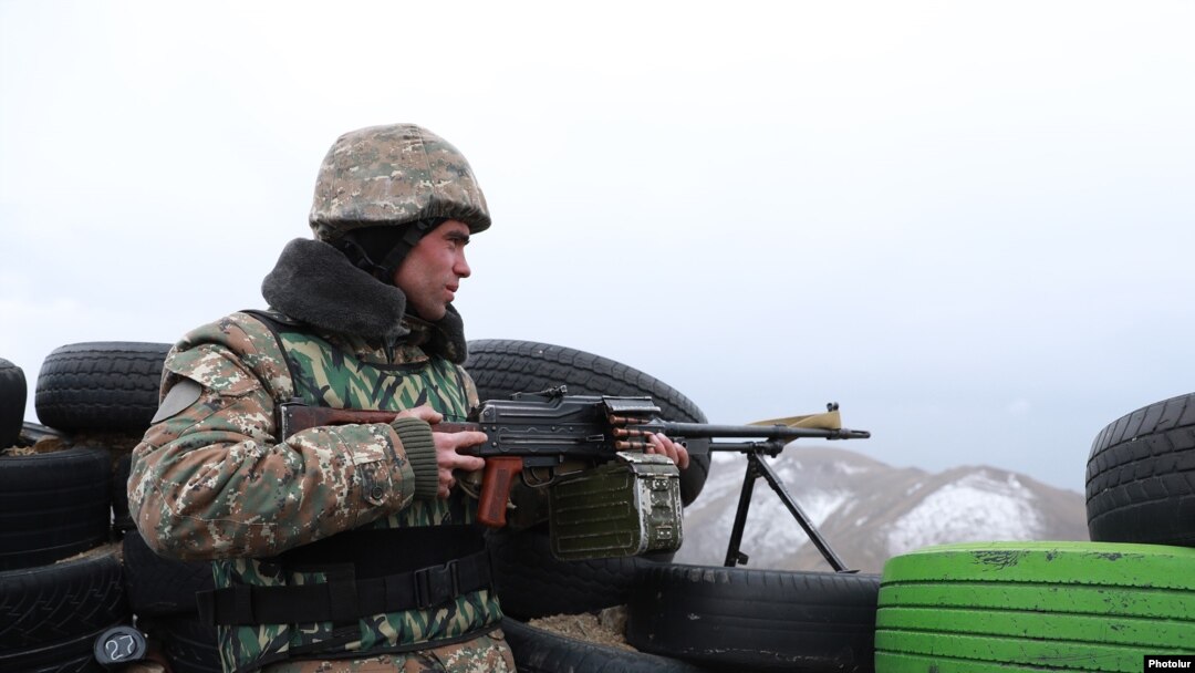 Armenia - An Armenian soldier stands guard on the border with Azerbaijan, November 12, 2021.