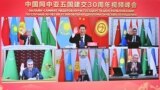 Chinese President Xi Jinping (top center) and his Central Asian counterparts -- Kazakh President Qasym-Zhomart Toqaev (top left), Kyrgyz President Sadyr Japarov (top right), Turkmen leader Gurbanguly Berdymukhammedov (bottom left), Tajik President Emomali Rahmon (bottom center), and President Shavkat Mirziyoev -- during a virtual summit to mark 30 years of relations in January 2022. 