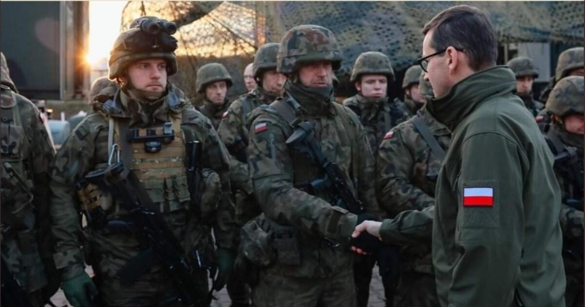 Poland Accuses Russia Of Backing Belarusian 'Attack' As Migrant Border Standoff Intensifies