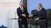 Finnish President Sauli Niinisto (right) and NATO Secretary-General Jens Stoltenberg shake hands at a press conference during talks at the presidential summer residence Kultaranta, in Naantali, Finland, on June 12.