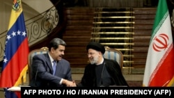 Predsednik Venecuele Nikolas Maduro i predsednik Irana Ebrahim Raisi tokom sastnka u Teheranu, 11. jun 2022. 