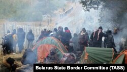  Migranti u kampu u blizini granice Belorusije sa Poljskom, 10. novembar 2021.