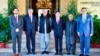 Pakistani Foreign Minister Shah Mahmood Qureshi (third left) with the envoys from the United States, China, and Russia before the "Troika plus" group conference in Islamabad on November 11.
