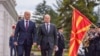 North Macedonia's prime minister, Dimitar Kovacevski (left), with German Chancellor Olaf Scholz in Skopje on June 11. 